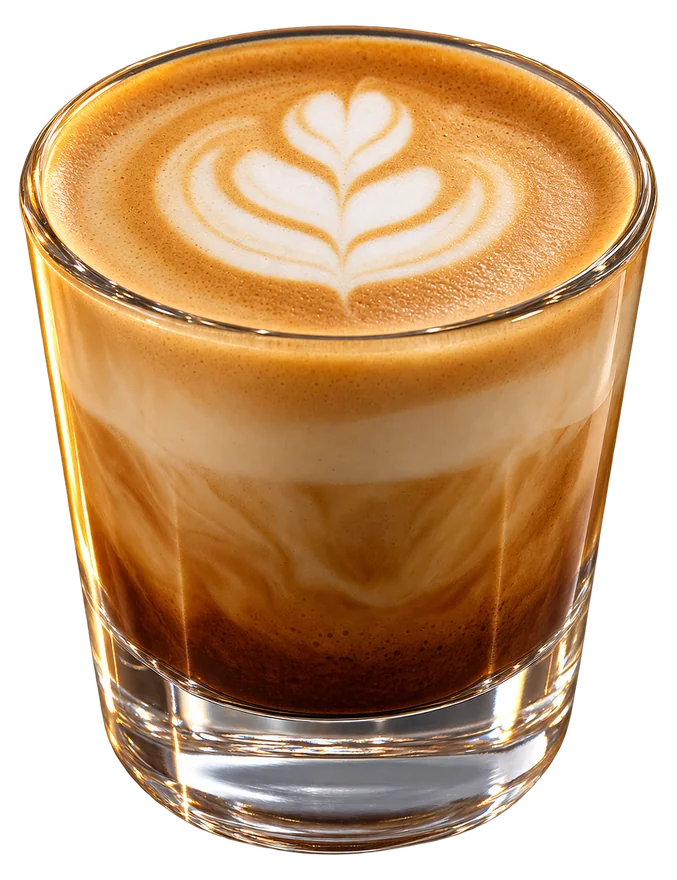 A cortado in a short glass tumbler, espresso under a thin layer of steamed milk