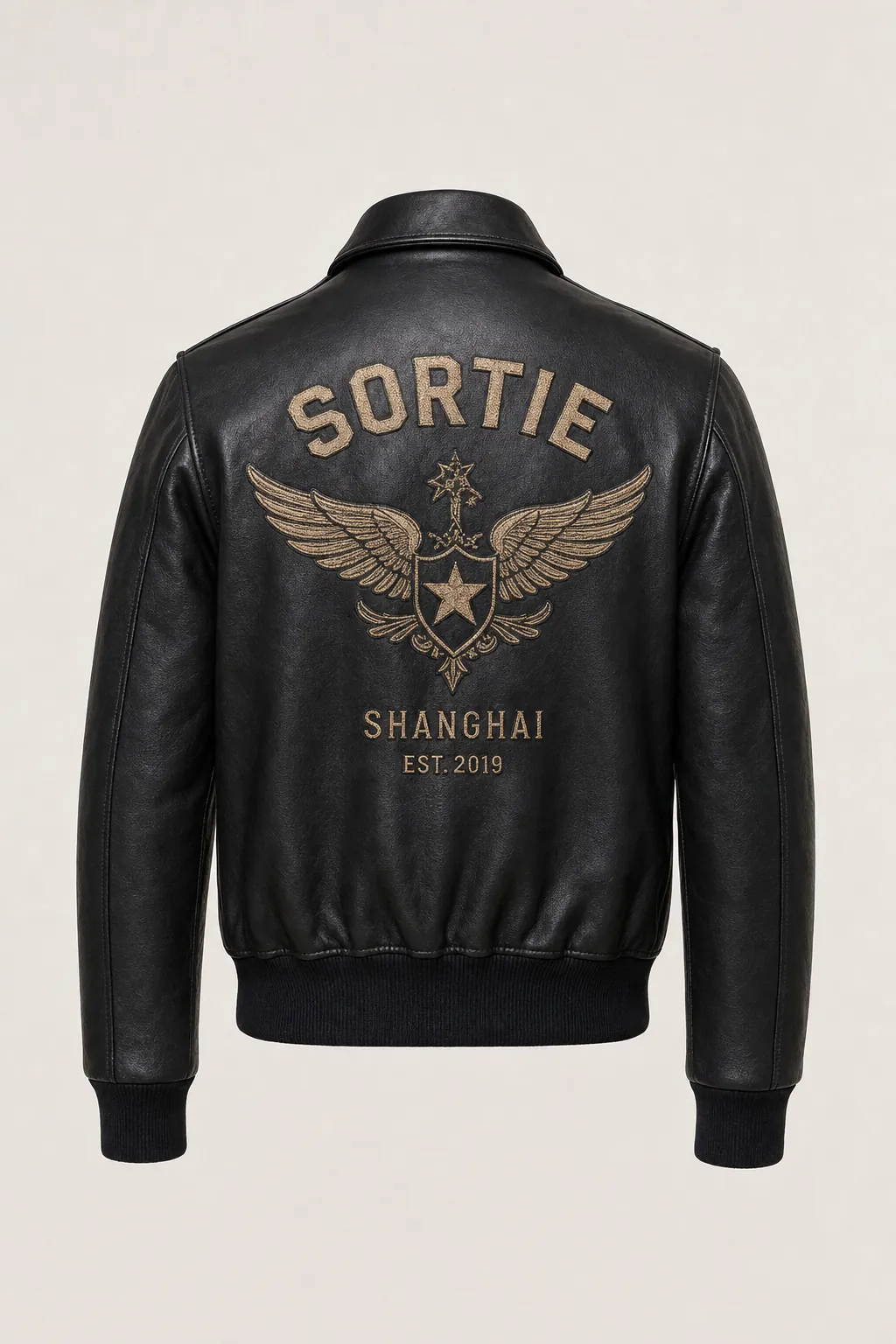 Back of the black A-2 with the embroidered SORTIE winged patch, Shanghai, established 2019